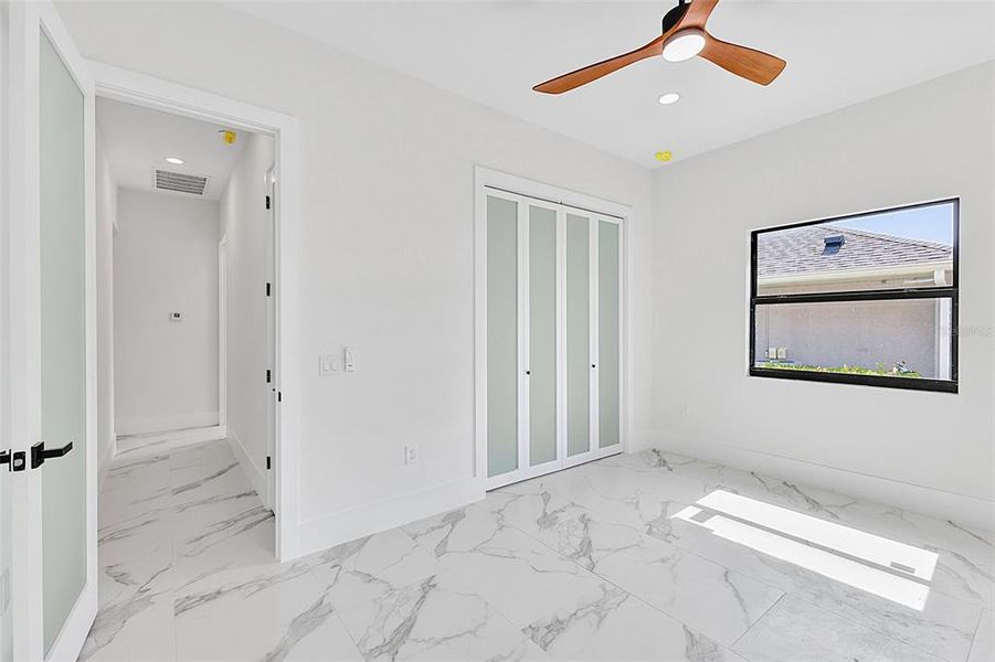 Spacious, unfurnished interior of a new home in , Port Charlotte (Image 47).