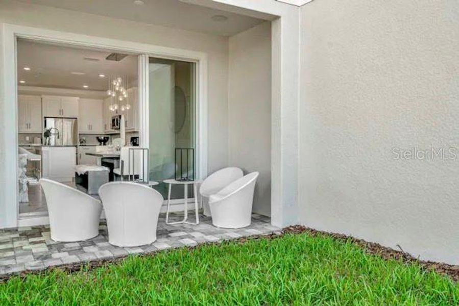 Exterior details and patio area of a home in Lagoon Residences at Epperson, Wesley Chapel (Image 4).