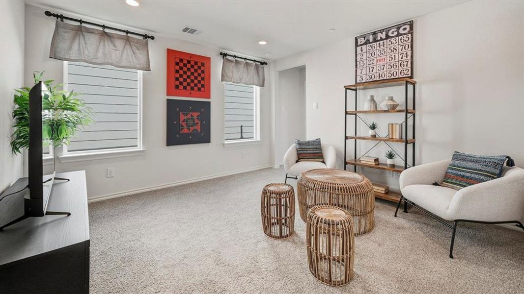 Sitting room featuring carpet flooring and recessed lighting Sitting room featuring carpet flooring and recessed lighting
