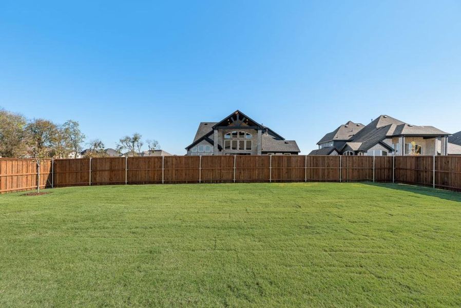 Exterior details and patio area of a home in Dominion of Pleasant Valley, Wylie (Image 4).