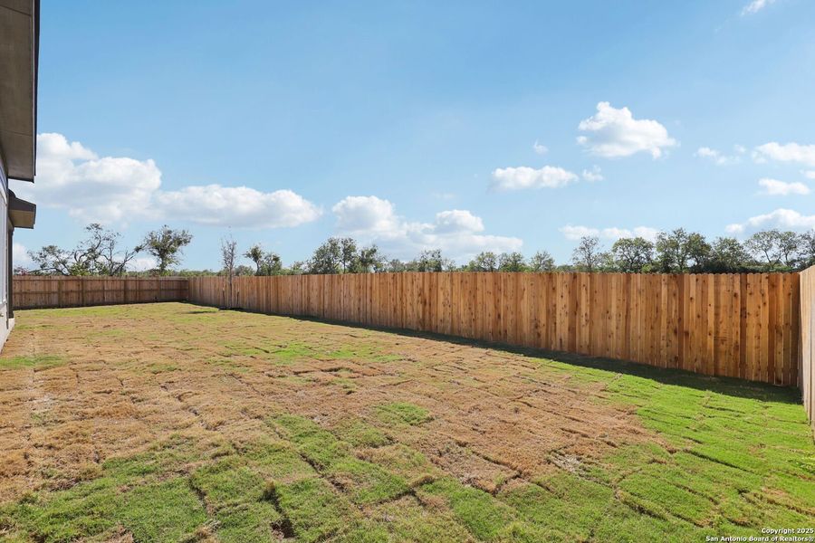 Exterior details and patio area of a home in Carmel Ranch, Schertz (Image 3).
