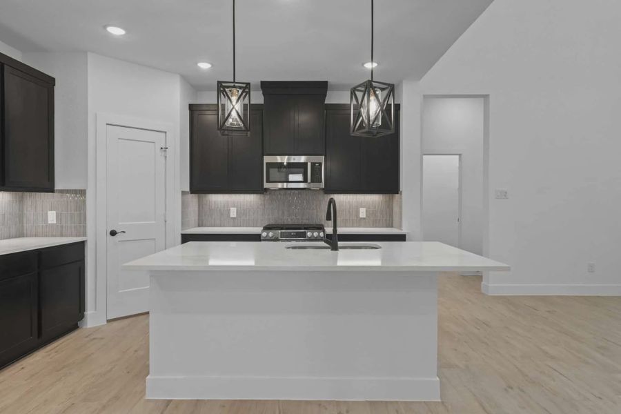 Representative furnished interior of a home built from the San Francisco by Chesmar Homes in The Woodlands Hills, Willis (Image 9). Representative furnished interior of a home built from the San Francisco by Chesmar Homes in The Woodlands Hills, Willis (Image 9).