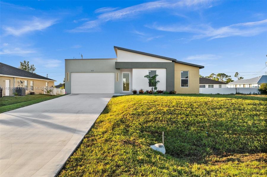 Front exterior of a new home in , Cape Coral, FL, highlighting curb appeal (Image 16).