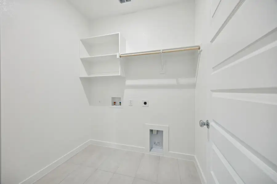 Utility Room in the Stanley II home plan by Trophy Signature Homes – REPRESENTATIVE PHOTO Utility Room in the Stanley II home plan by Trophy Signature Homes – REPRESENTATIVE PHOTO
