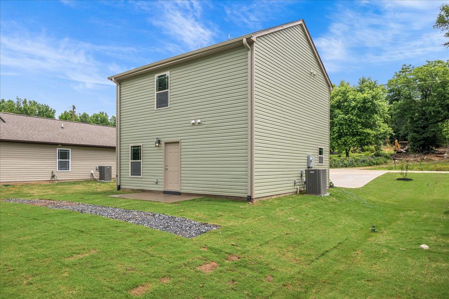 Representative exterior photo of a completed home built from the Branson by Enchanted Homes in Gentry Place, Spartanburg, SC (Image 13).