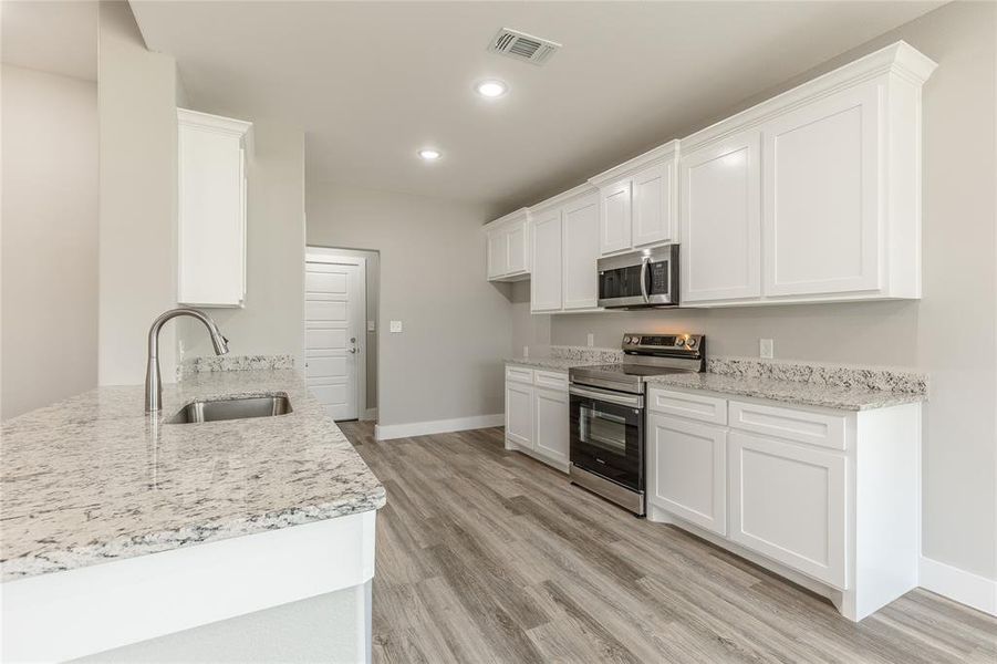 Furnished interior view inside a new home in , Sherman (Image 7).