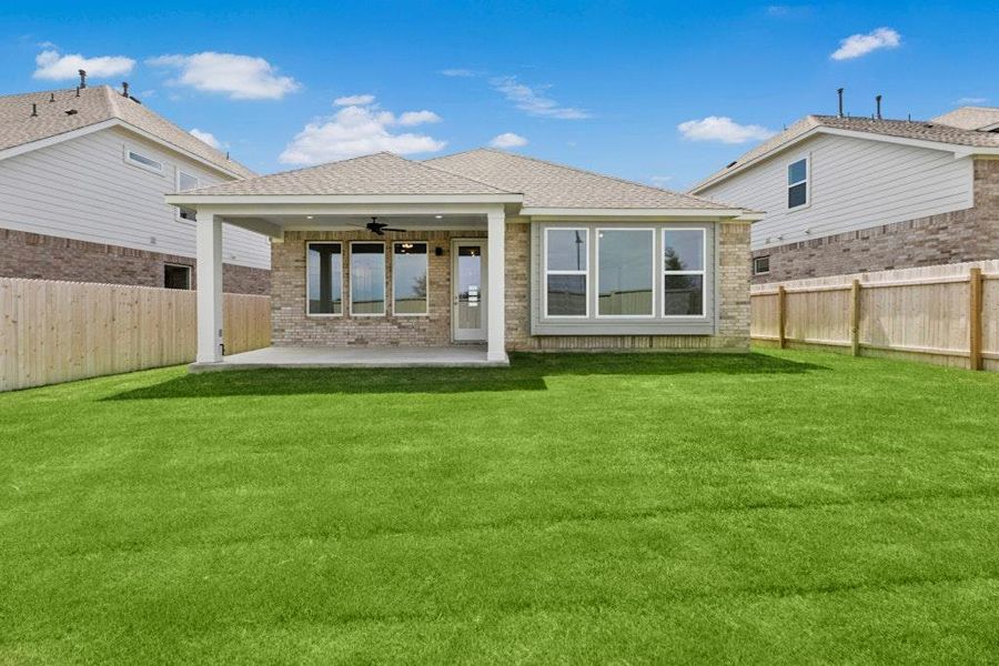 Front exterior of a new home in Santa Rita Ranch, Liberty Hill, TX, highlighting curb appeal (Image 2). Front exterior of a new home in Santa Rita Ranch, Liberty Hill, TX, highlighting curb appeal (Image 2).