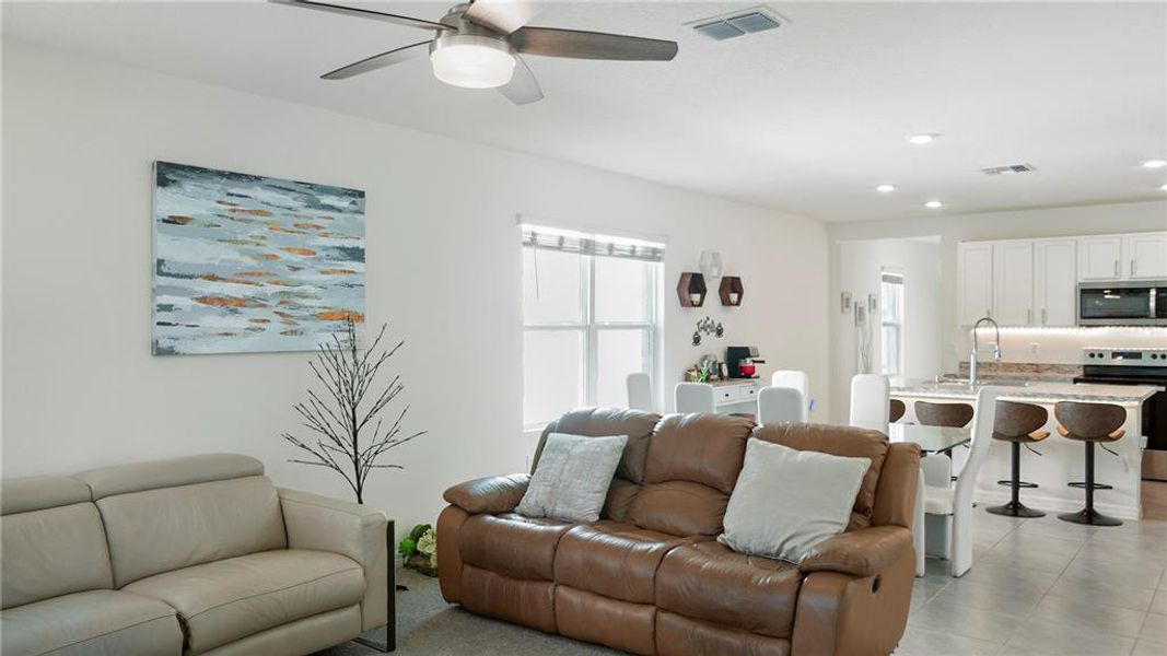 Furnished interior view inside a new home in Charles Cove Express, Davenport (Image 6).