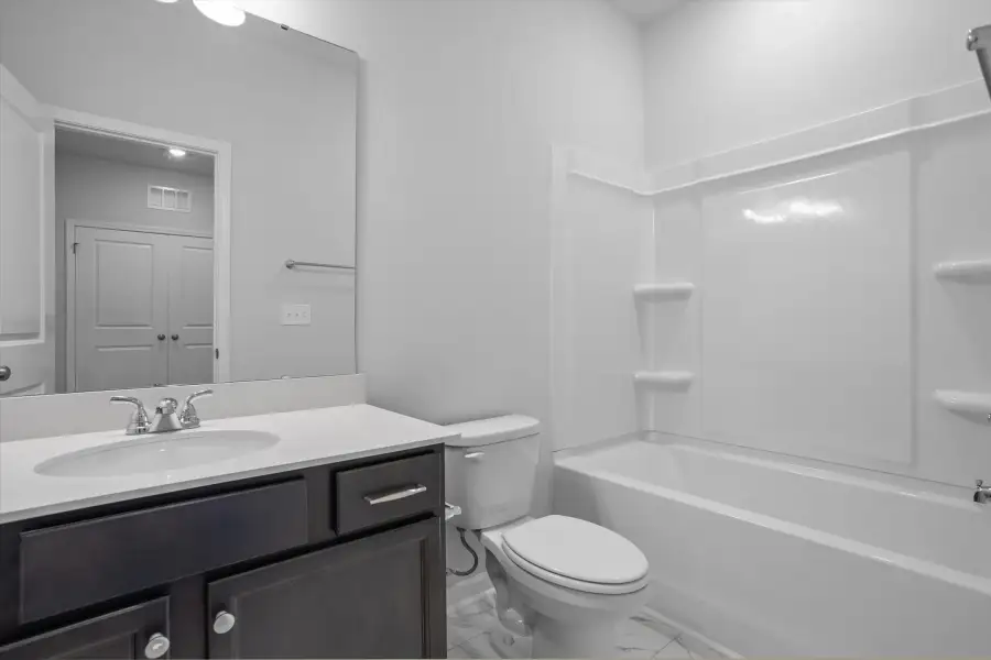 Furnished interior view inside a new home in West Main Townhomes, Sanford (Image 10).