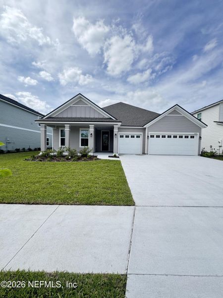 Front exterior of a new home in Hyland Trail, Green Cove Springs, FL, highlighting curb appeal (Image 20).