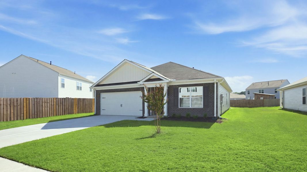 Front exterior of a new home in Madeline Farm, New Bern, NC, highlighting curb appeal (Image 19).