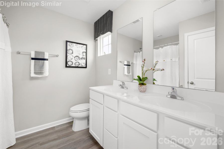 Owners Bath with Dual Ceramic Sinks, Linen Closet