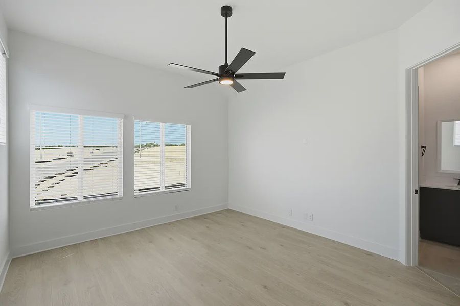 Representative unfurnished interior of a home built from the Athena by Chesmar Homes in Prominence Urban, San Antonio (Image 32).