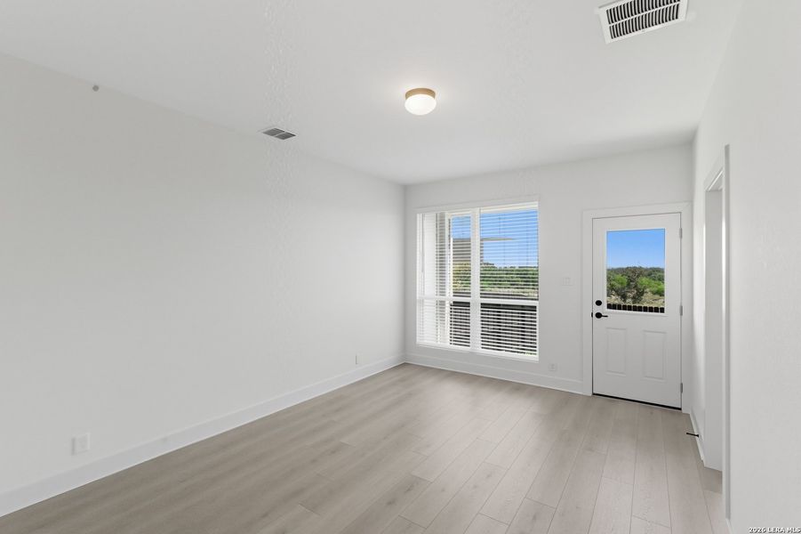 Spacious, unfurnished interior of a new home in Centero at Stone Oak, San Antonio (Image 19).