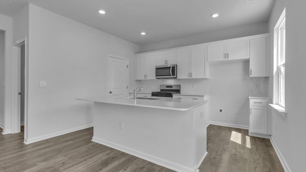 Furnished interior view inside a new home in The Preserve at Kinsley, Jamestown (Image 4).