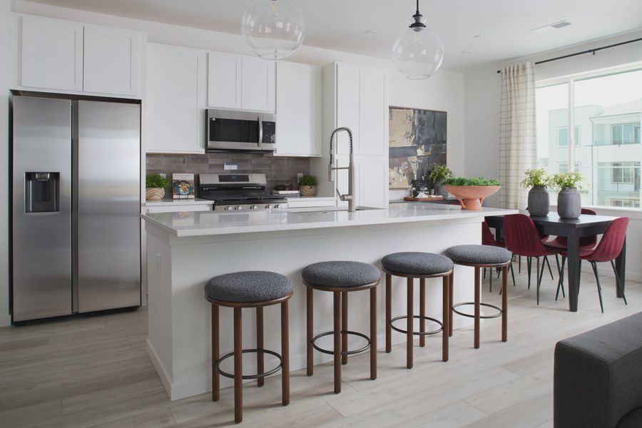 Furnished interior view inside a new home in Lyric at RidgeGate Townhomes, Lone Tree (Image 3).