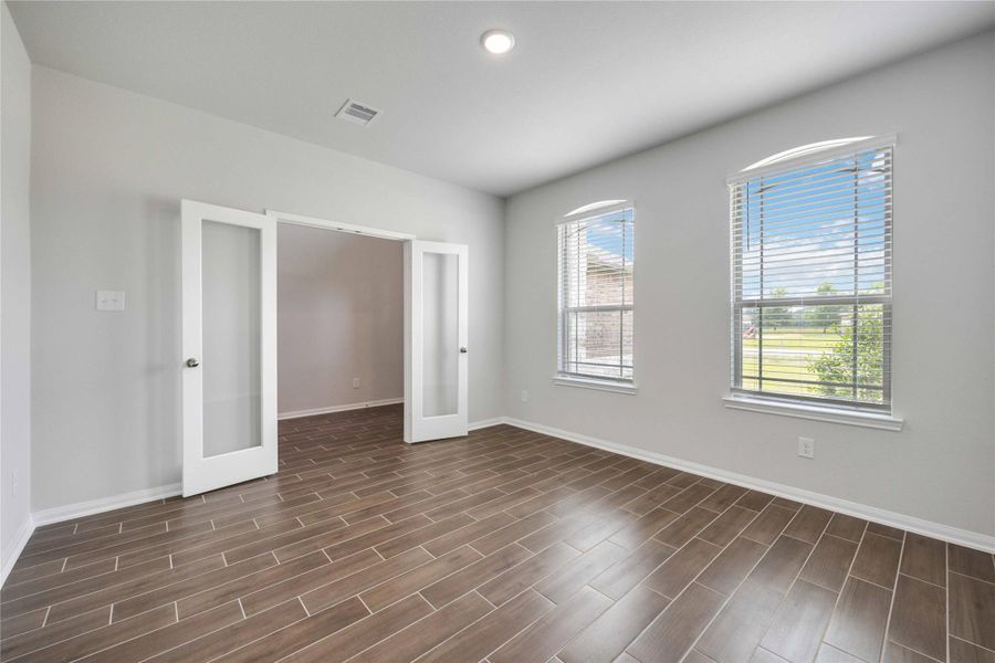 Enjoy working from home in the spacious study with large windows that let in the perfect natural light.