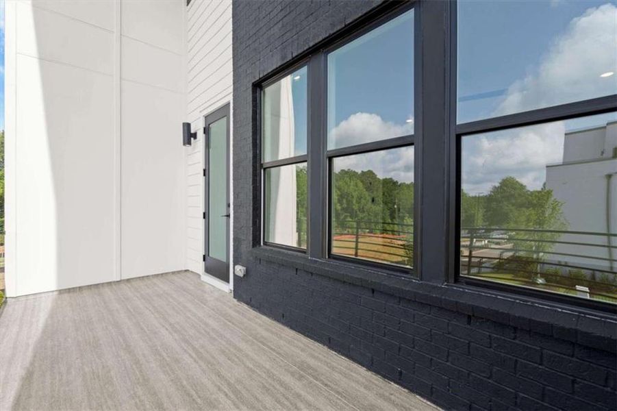 Exterior details and patio area of a home in The Gathering – Alpharetta, Alpharetta (Image 4).