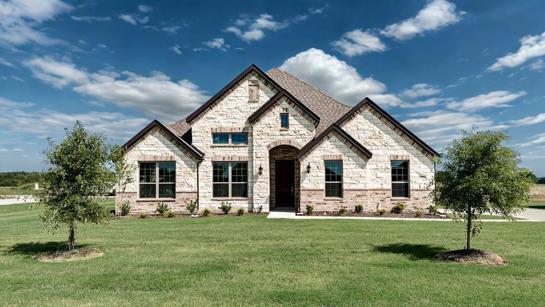 Front exterior of a new home in Mallard Point, Greenville, TX, highlighting curb appeal (Image 26). Front exterior of a new home in Mallard Point, Greenville, TX, highlighting curb appeal (Image 26).