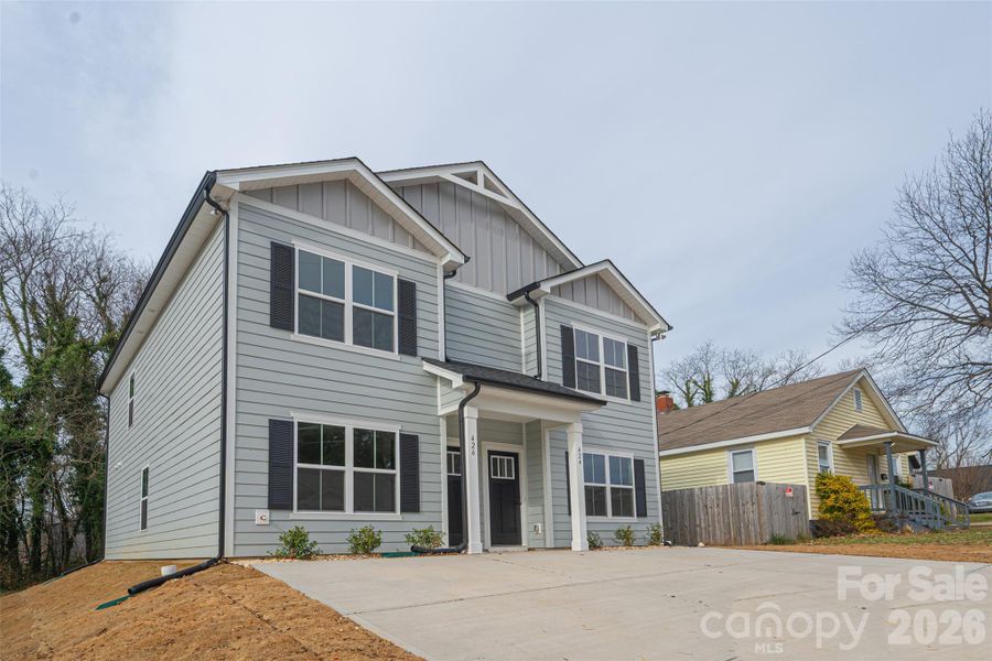 Front exterior of a new home in , Hickory, NC, highlighting curb appeal (Image 16).