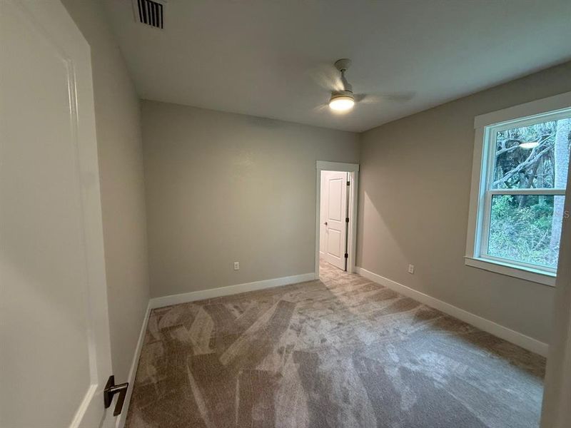 Spacious, unfurnished interior of a new home in , Port Charlotte (Image 16).