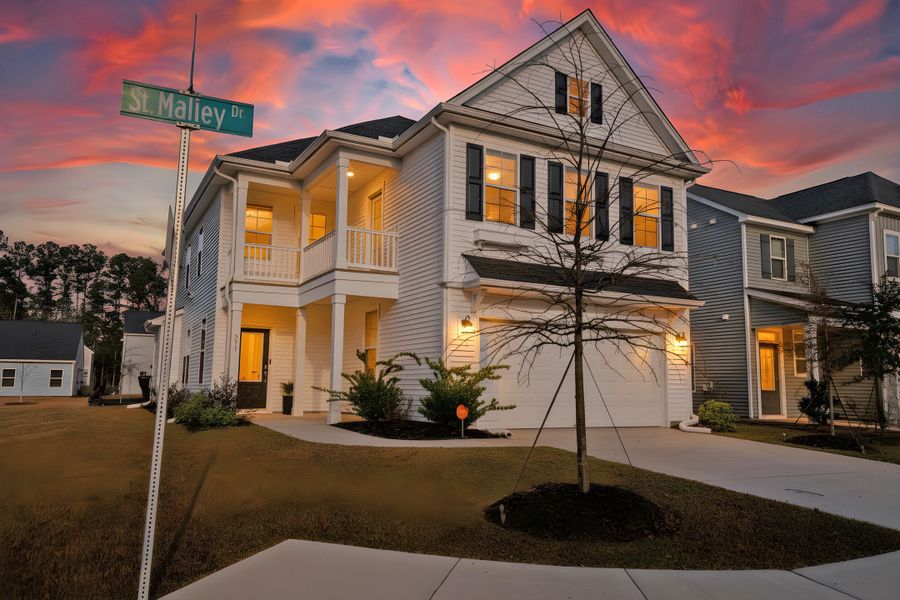Front exterior of a new home in Six Oaks, Summerville, SC, highlighting curb appeal (Image 1). Front exterior of a new home in Six Oaks, Summerville, SC, highlighting curb appeal (Image 1).