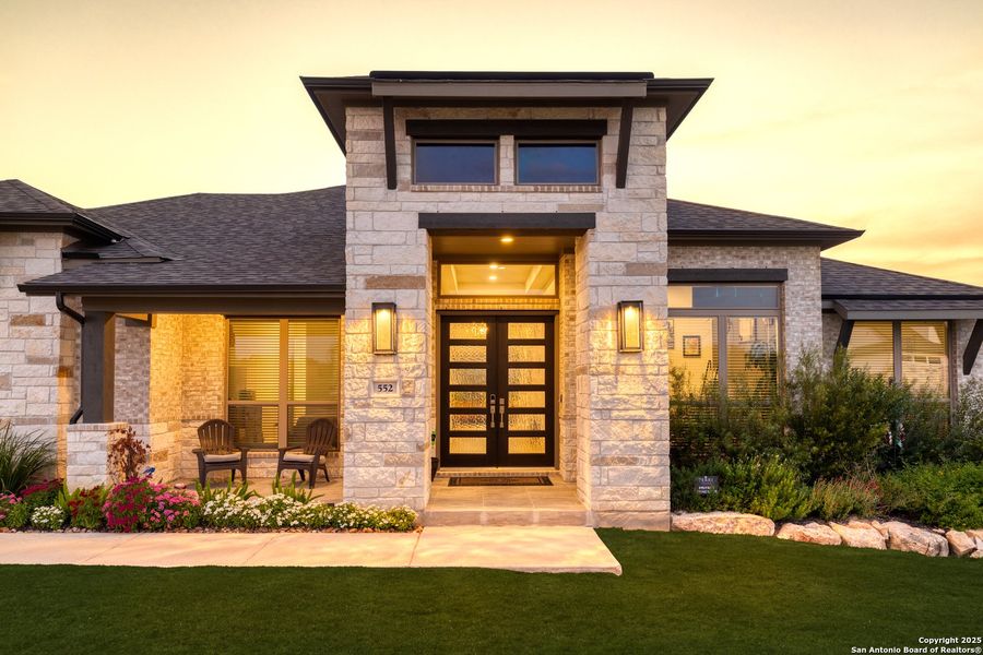 Front exterior of a new home in Megan's Landing 1/2 Acre, San Antonio, TX, highlighting curb appeal (Image 18). Front exterior of a new home in Megan's Landing 1/2 Acre, San Antonio, TX, highlighting curb appeal (Image 18).