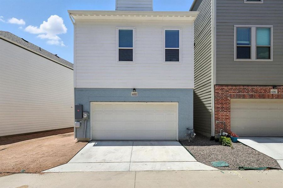 View of the rear entry 2 car garage.