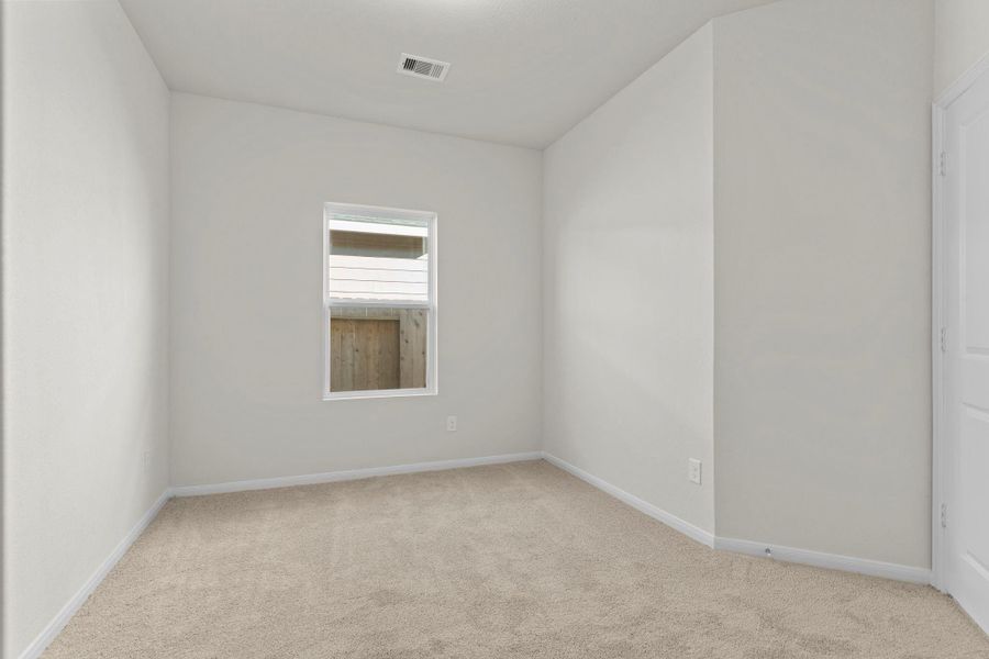 Another spacious secondary bedroom with a neutral color palette and plush carpet, providing comfort and flexibility for family, guests, or hobbies. Another spacious secondary bedroom with a neutral color palette and plush carpet, providing comfort and flexibility for family, guests, or hobbies.