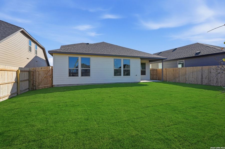 Exterior details and patio area of a home in Dove Song, Marion (Image 3).