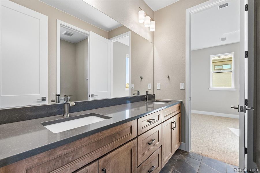 Furnished interior view inside a new home in Legends at Lyric, Lone Tree (Image 7).