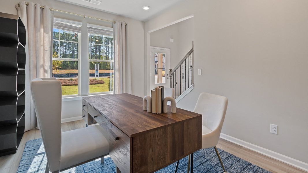 Representative furnished interior of a home built from the McKinley II by DRB Homes in Northcroft, Loganville (Image 6).
