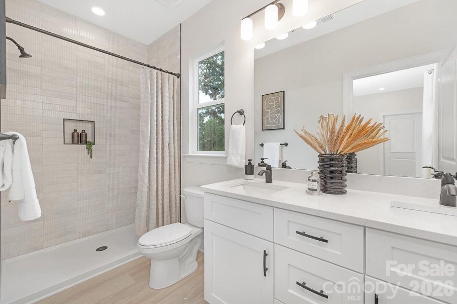 Furnished interior view inside a new home in , Charlotte (Image 12).