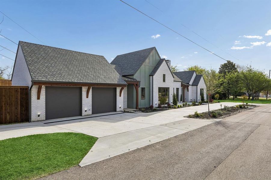 Front exterior of a new home in , Dallas, TX, highlighting curb appeal (Image 21).