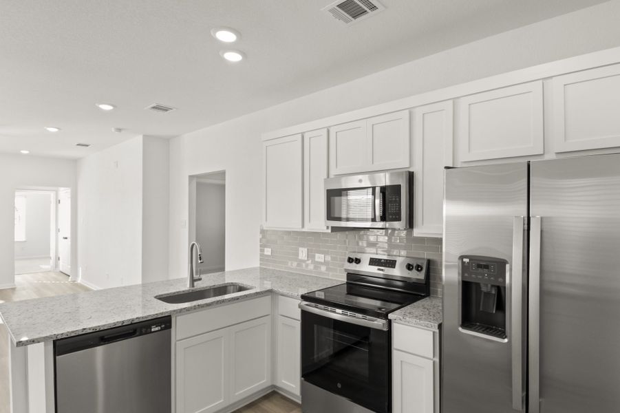 Furnished interior view inside a new home in Cool Water at Sonterra, Jarrell (Image 8).