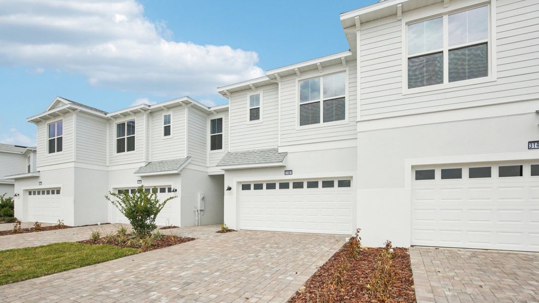 Front exterior of a new home in Isla Mirada, San Antonio, FL, highlighting curb appeal (Image 22).
