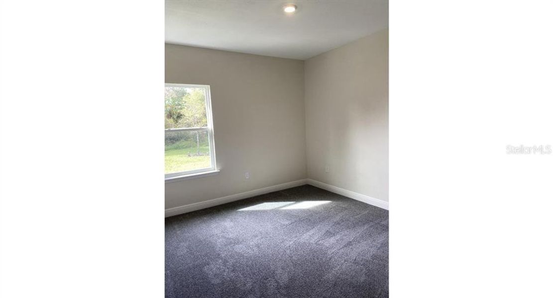 Spacious, unfurnished interior of a new home in , North Port (Image 9). Spacious, unfurnished interior of a new home in , North Port (Image 9).