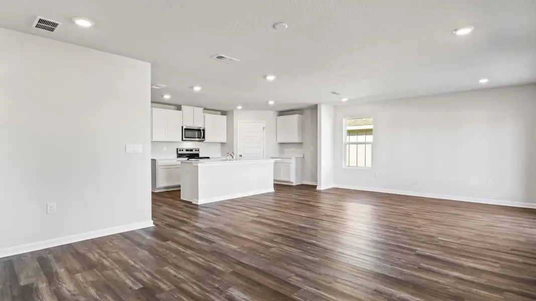 Representative unfurnished interior of a home built from the The Lismore by D.R. Horton in Magnolia at the Bluffs Phase 3, Freeport (Image 13).