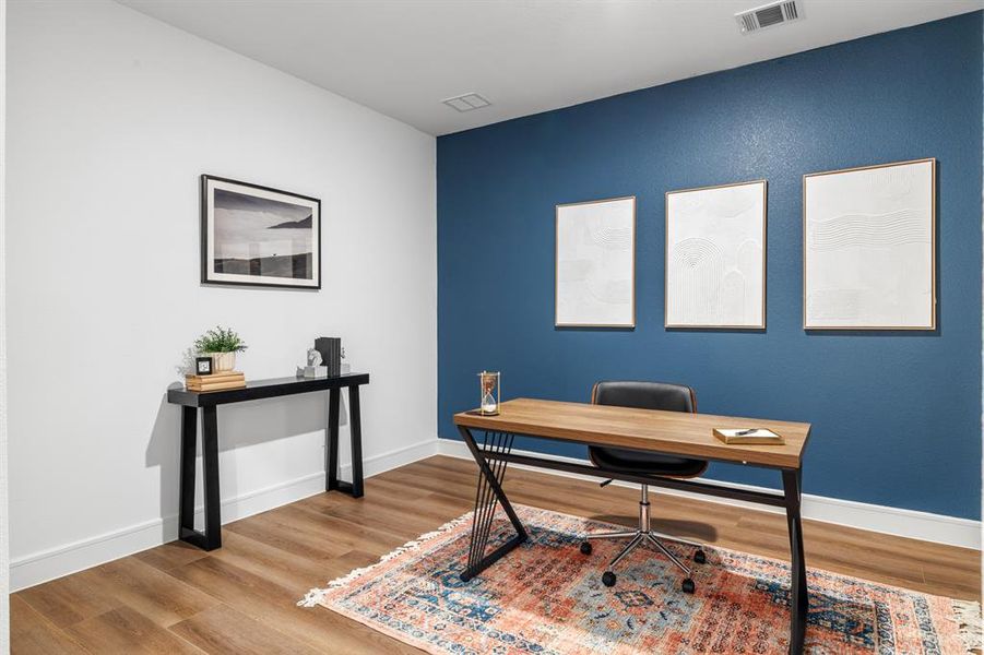 Office area with wood finished floors