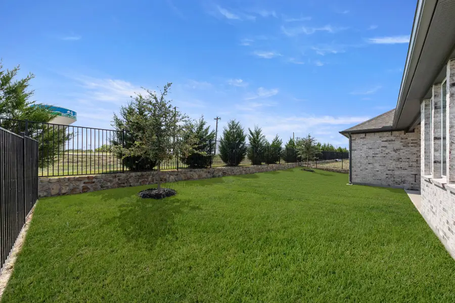 Exterior details and patio area of a home in Nelson Lake Estates, Rockwall (Image 18).