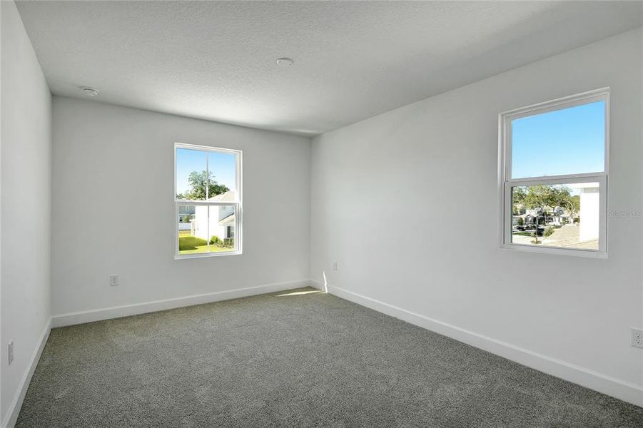 Spacious, unfurnished interior of a new home in Seasons at Wekiva Ridge, Mount Dora (Image 13).