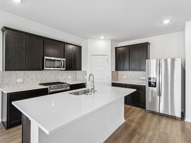 Furnished interior view inside a new home in Colony at Cole Springs - Boulevard Collection, Buda (Image 5).