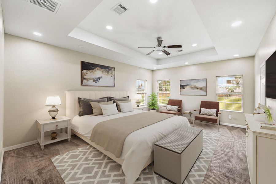 Virtually Staged: This expansive primary suite offers a peaceful retreat with a spacious open layout, plush carpeting, and soft neutral tones throughout. The elegant tray ceiling with recessed lighting adds architectural character and enhances the room’s airy feel, while multiple windows bring in abundant natural light and backyard views.