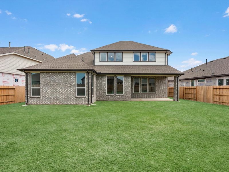 Exterior details and patio area of a home in Wildrye, Waller (Image 3).
