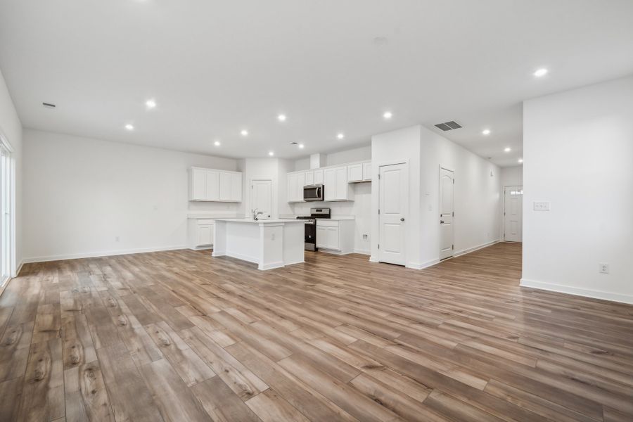 A large empty kitchen. A large empty kitchen.