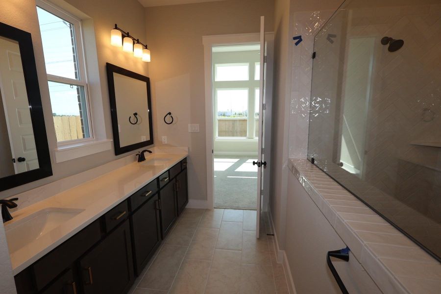 Furnished interior view inside a new home in Elyson - Reserve Collection, Katy (Image 15).