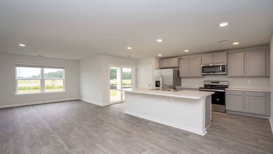 Representative furnished interior of a home built from the KERRY by D.R. Horton in Stanbury Creek, Supply (Image 5).
