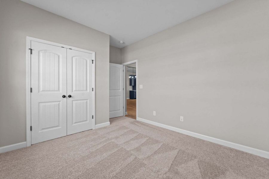 Representative unfurnished interior of a home built from the Weymouth by Caviness & Cates Communities in Bartlett Manor, Youngsville (Image 98).