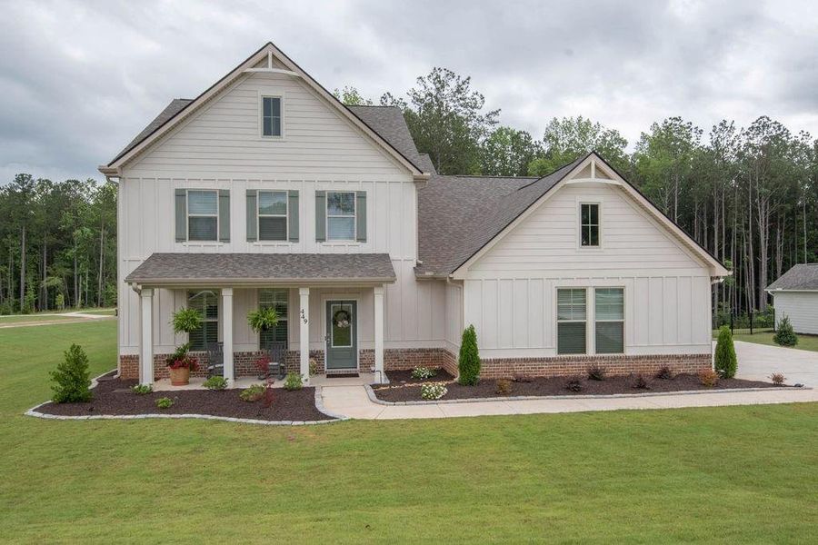 Front exterior of a new home in , Senoia, GA, highlighting curb appeal (Image 39). Front exterior of a new home in , Senoia, GA, highlighting curb appeal (Image 39).