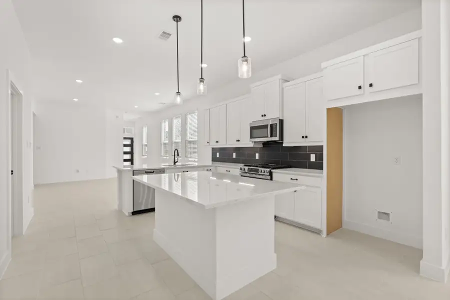 Furnished interior view inside a new home in The Woodlands Hills, Willis (Image 8). Furnished interior view inside a new home in The Woodlands Hills, Willis (Image 8).